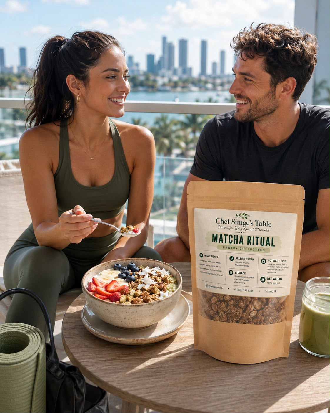 Couple enjoying granola bowls on a balcony overlooking Biscayne Bay