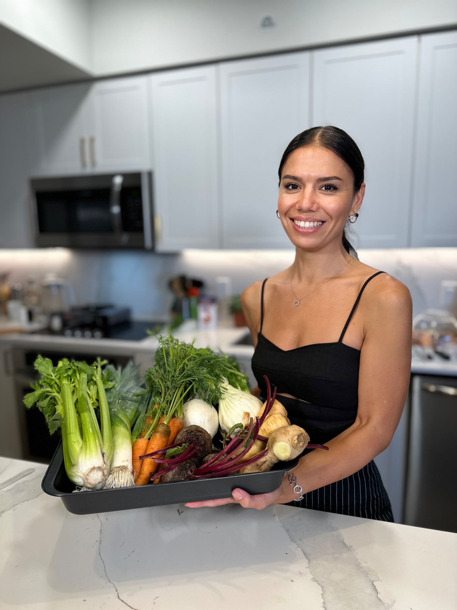 Chef Simge with fresh vegetables